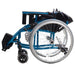 Side view of a blue Top Gun Enforcer wheelchair in it's collapsed mode for transport.