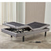 Lifestyle shot of the Top Gun Royal King Single Adjustable Bed in a bedroom, with the head and feet in the partially elevated positions