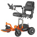 Side view of the Trek SupaScoota Safari Powerchair in Orange